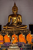 Bangkok Wat Pho, the southern wihan, one of the four side chapels around the ubosot. Buddha statue called Buddha Chinnaraja with five disciples seated in front. 